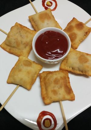 A picture of Paneer Pizza Pockets.