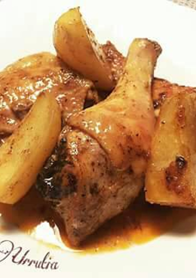 Una foto de Pollo especiado al horno con patatas