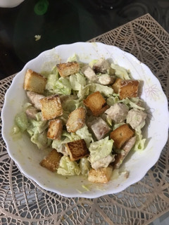 A picture of Chicken Caesar Salad.
