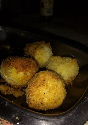 Una foto de Bombas de Arroz y Queso