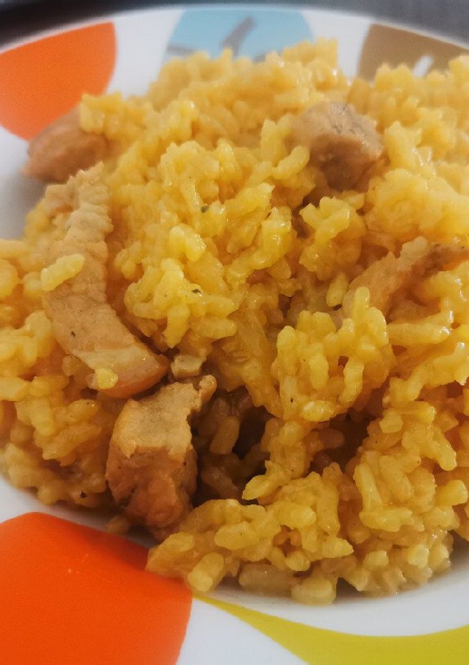 Una foto de Arroz con lomo y panceta