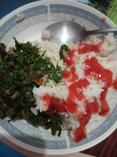 A picture of Rice sukuma and sauce.