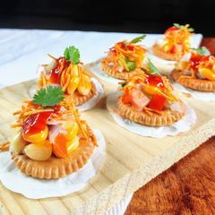 A picture of Monaco Sev Puri or cracker sev puri.