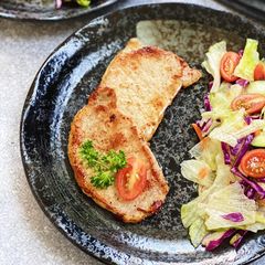 A picture of Easy Pan Seared Pork Chops with Garlic Red Wine Vinegar Salad.
