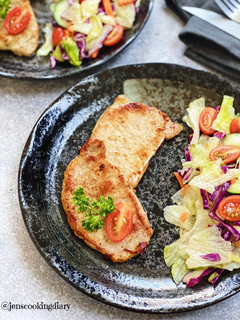 A picture of Easy Pan Seared Pork Chops with Garlic Red Wine Vinegar Salad.