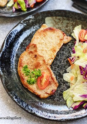 A picture of Easy Pan Seared Pork Chops with Garlic Red Wine Vinegar Salad.