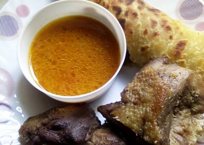 Deep fried duck served with soup and chapati