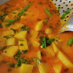 Alu in khas khas gravy A picture of Alu in khas khas gravy.