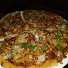 A picture of Pizza without yeast without cheese without oven.