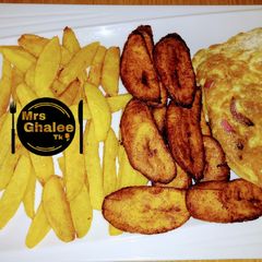 Chips and plantain with egg A picture of Chips and plantain with egg.