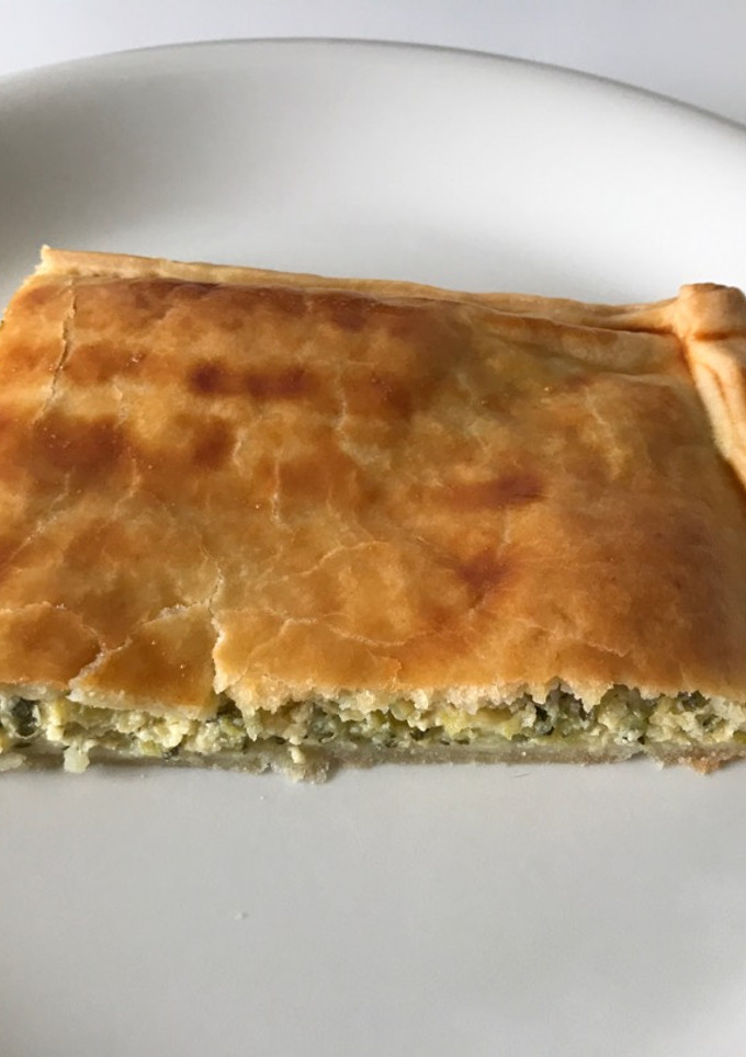 Una foto de Empanada de calabacín, queso y huevo