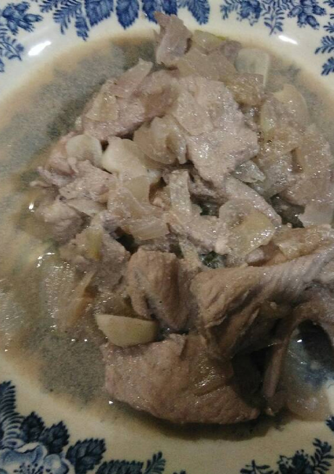 Una foto de Pollo al vino