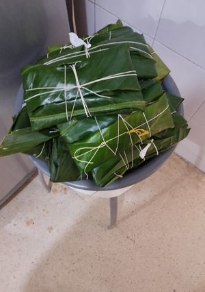 Una foto de Tamales o pasteles de cerdo y pollo