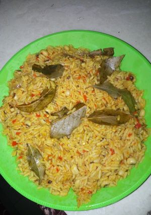 A picture of Jollof rice and beans.