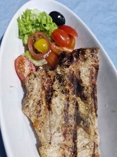 Una foto de Cerdo a la parrilla en Salsa de Naranja y Mostaza