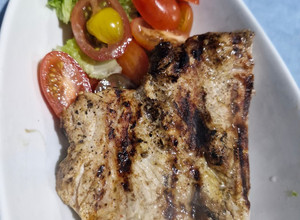 Una foto de Cerdo a la parrilla en Salsa de Naranja y Mostaza