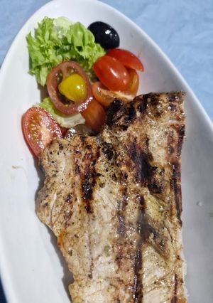 Una foto de Cerdo a la parrilla en Salsa de Naranja y Mostaza