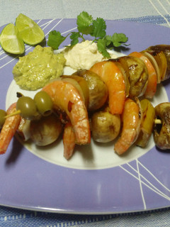 Una foto de Brochetas de Camarón y Champiñon