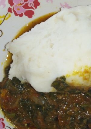 A picture of Pounded yam & ugu leave.