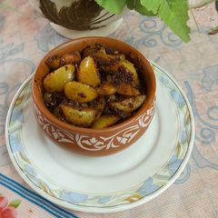 A picture of Amla (gooseberry) jaggery pickle.
