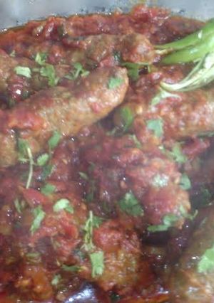 A picture of Seekh kabab karahi.