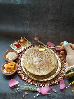 खमंग तिळगुळ पोळी (tilgul poli recipe in marathi) रेसिपी चे मुख्य फोटो