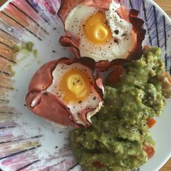 A picture of Egg Ham baked cups with Guacamole.