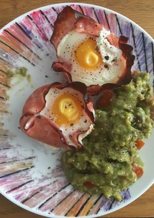 A picture of Egg Ham baked cups with Guacamole.