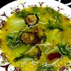 A picture of Tetor dal (lentils cooked with bitter gourd and bottle gourd).