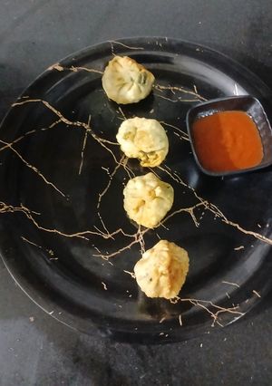 A picture of Corn-Spinach Momos.