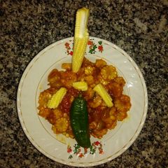 A picture of Prawn chilli baby corn.