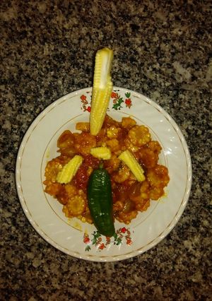A picture of Prawn chilli baby corn.