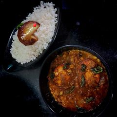 A picture of Lentil fry with boiled egg.