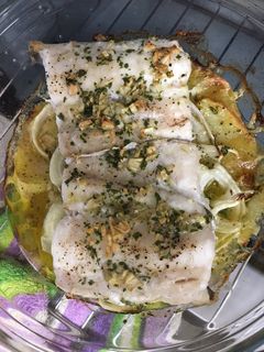 Una foto de Merluza horno