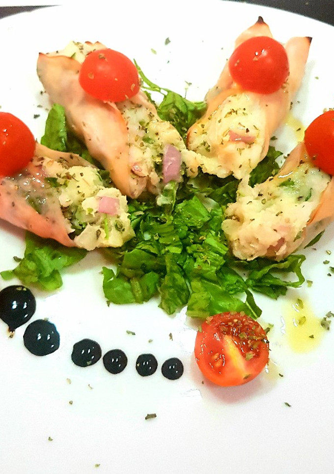 Una foto de Rollitos de pavo relleno de puré de papas y cebolla