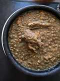Guiso de lentejas con asado de tira