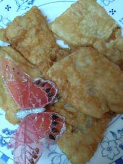 Una foto de Filetes de merluza rebozados