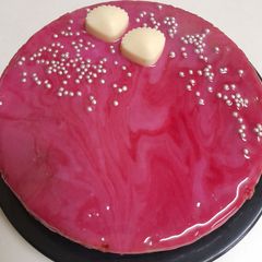 A picture of Mirror glaze vanilla cake.