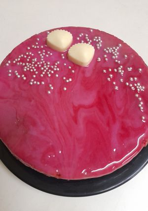 A picture of Mirror glaze vanilla cake.