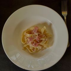 Tagliatelle with white sauce, ham A picture of Tagliatelle with white sauce, ham.
