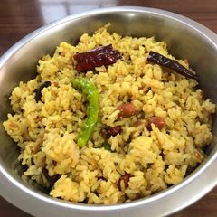 Pulihora (tamarind rice) A picture of Pulihora (tamarind rice).