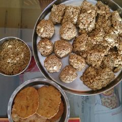 Til laddoo and chiki A picture of Til laddoo and chiki.