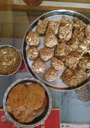 A picture of Til laddoo and chiki.