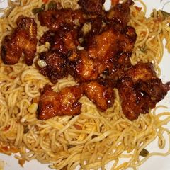 A picture of Crispy chilli babycorn with spicy schezwan noodles.