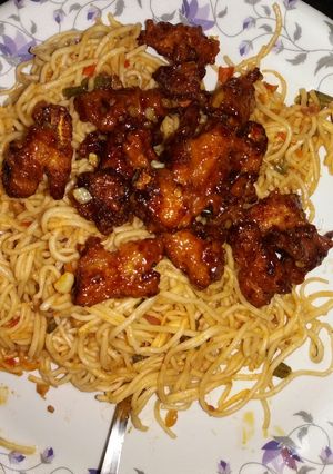 A picture of Crispy chilli babycorn with spicy schezwan noodles.