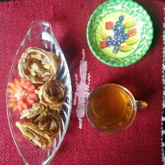 A picture of Fried rings with green tea.