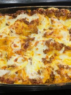 A picture of Baked Lasagna with Tomato Sauce.