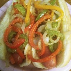 A picture of Sausage and Peppers Dogs.