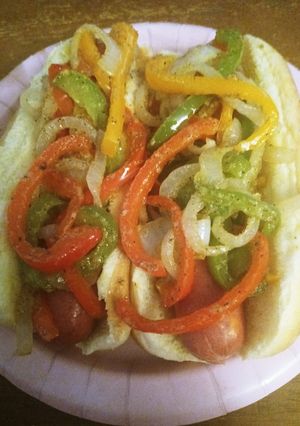 A picture of Sausage and Peppers Dogs.