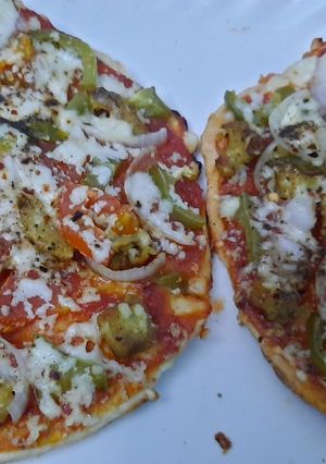 চিকেন পিজ্জা 🍪 (chicken pizza recipe in Bengali) রেসিপির প্রধান ছবি
